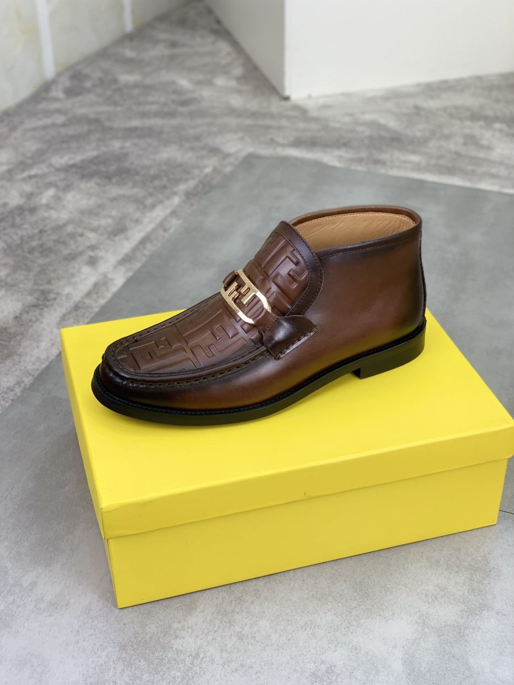 Fendi Embossed Metal-Hardware Slip-On Boots — front